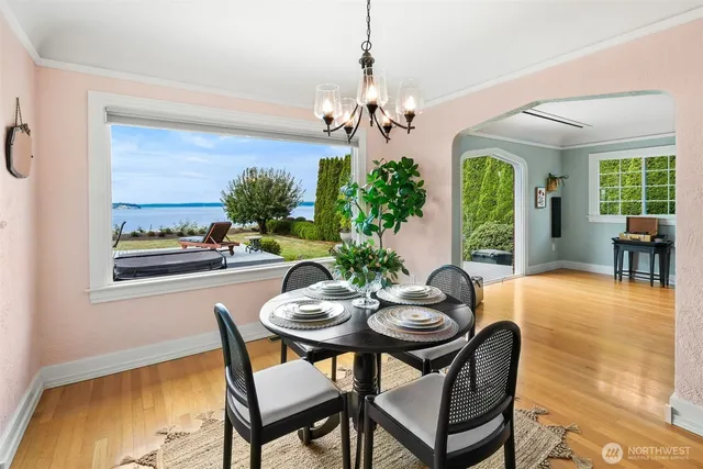 a kitchen with stainless steel appliances granite countertop a refrigerator sink and stove