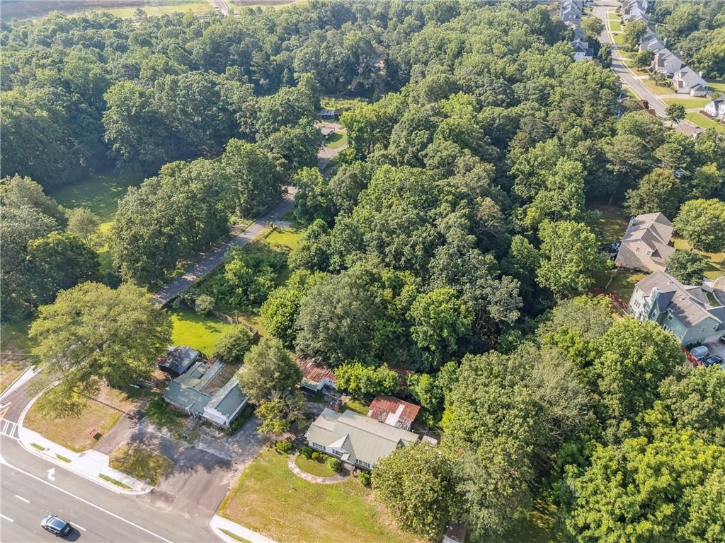4072 Cumming Highway Canton, GA 30115 - Photo 5 of 10 an aerial view of a house with a yard