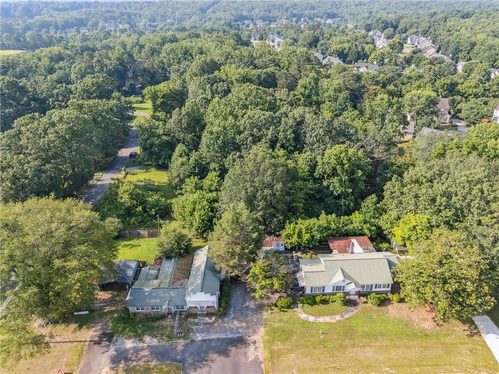 4072 Cumming Highway Canton, GA 30115 - Photo 6 of 10 an aerial view of a house with yard swimming pool and outdoor seating