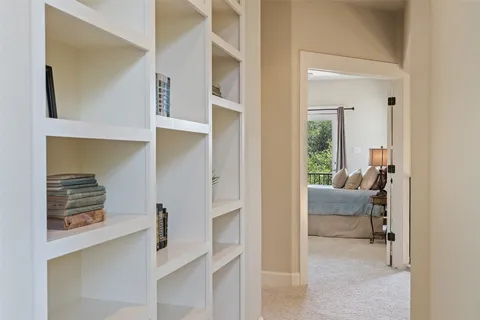 a view of living room with furniture and a window