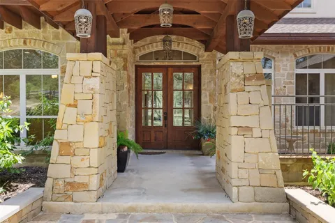 a view of a brick wall with a window