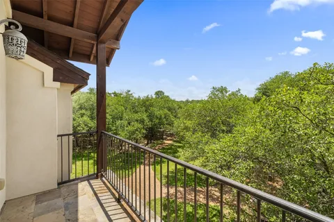 a view of a balcony with an outdoor space