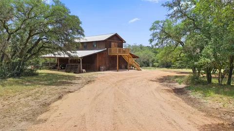 a house with trees in front of it