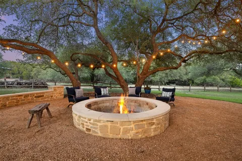 a view of a swimming pool with a garden
