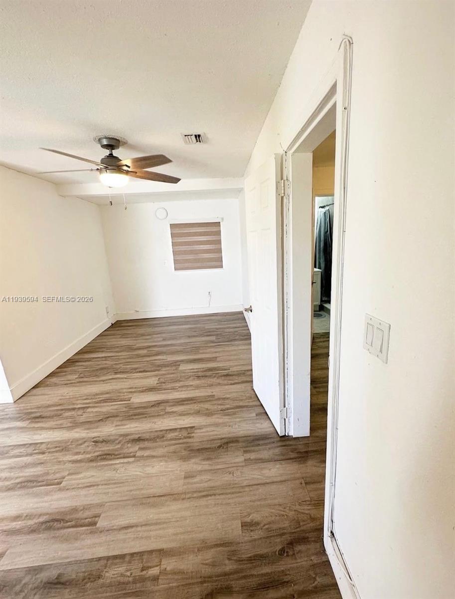 6537 Southwest 39th Terrace Miami, FL 33155 - Photo 20 of 22 a view of a room with wooden floor