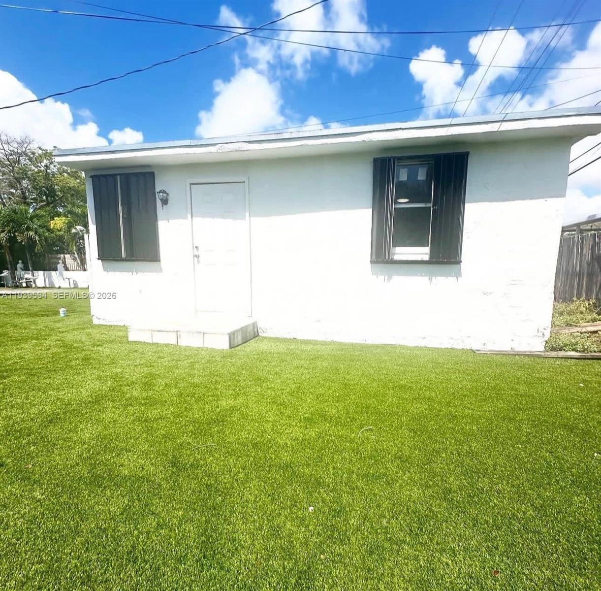 6537 Southwest 39th Terrace Miami, FL 33155 - Photo 2 of 22 a view of a house with a garden