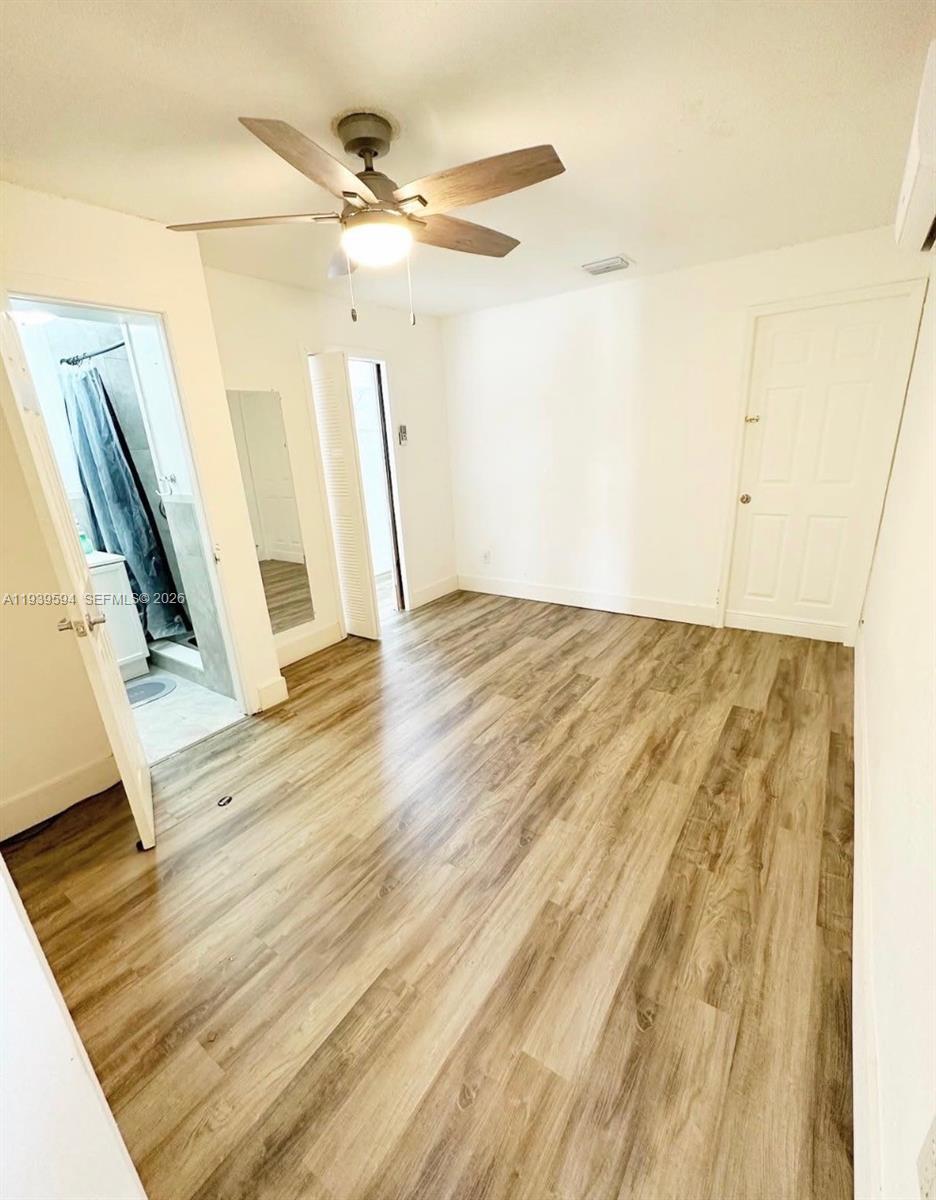 6537 Southwest 39th Terrace Miami, FL 33155 - Photo 21 of 22 a view of an entryway with wooden floor