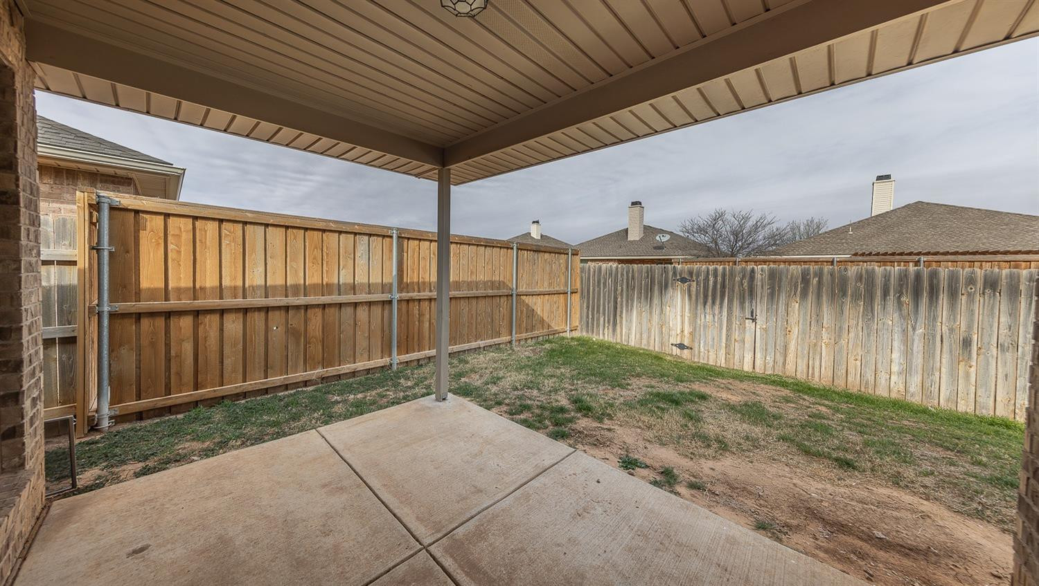 5504 110th Street Lubbock, TX 79424 - Photo 20 of 23 a backyard of a house with lake view
