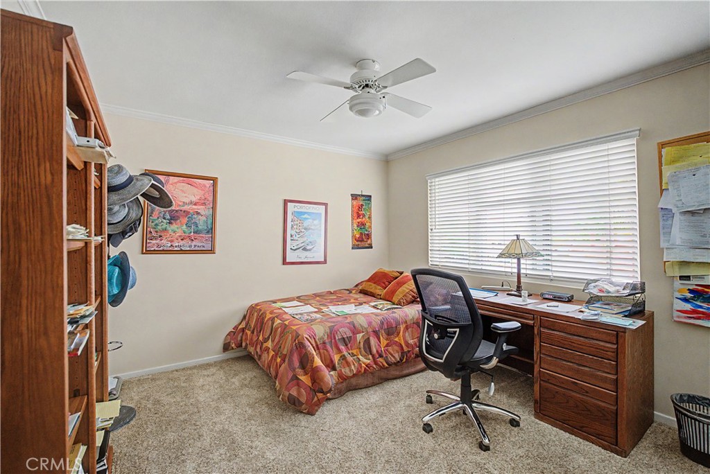 22671 Town Crier Road Calabasas, CA 91302 - Photo 34 of 35 a bedroom with a bed and a window