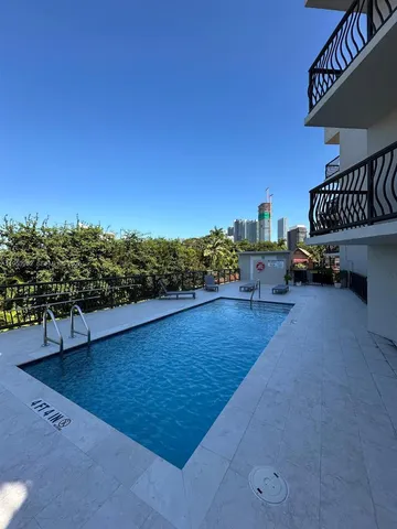 a view of a terrace with chairs