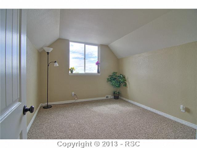 10865 Falling Star Road Fountain, CO 80817 - Photo 19 of 23 2nd Upstairs bedroom w/new carpet & custom paint. Lots of natural light.