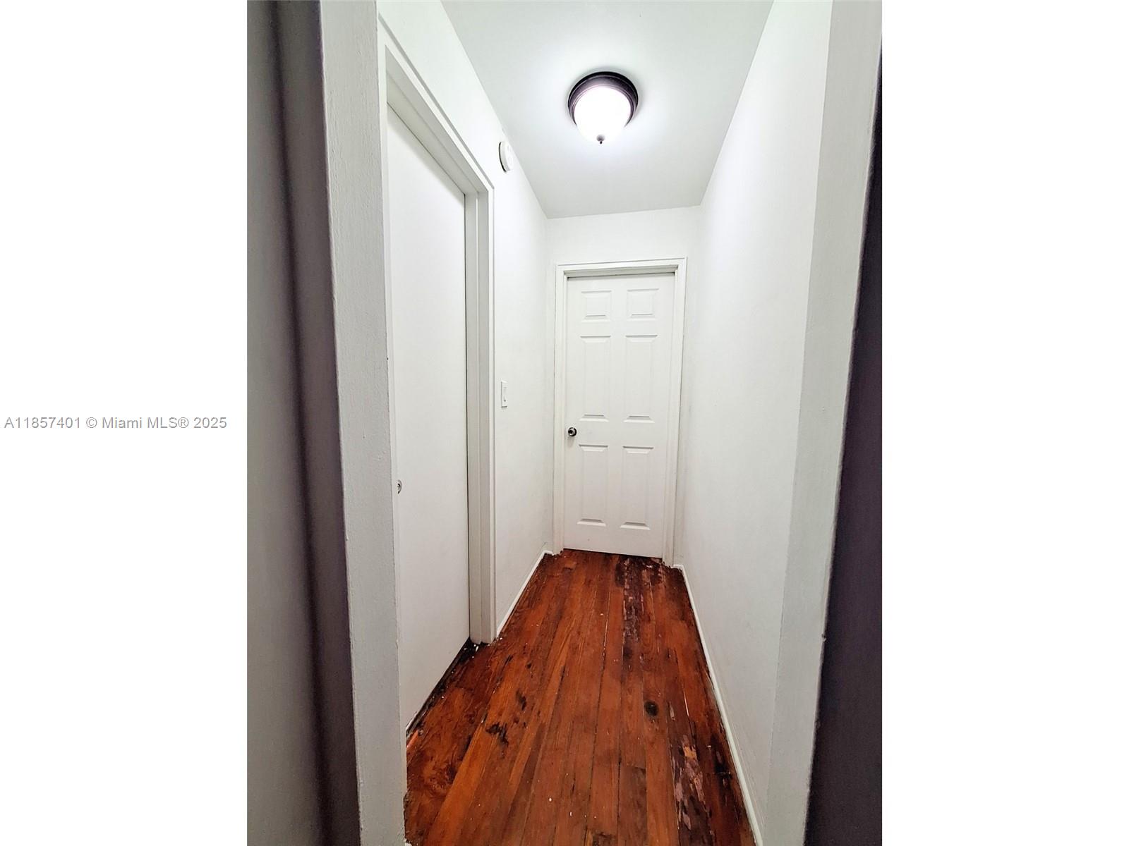 1770 Meridian Avenue, Unit 207 Miami Beach, FL 33139 - Photo 16 of 26 a very nice looking hallway with a window