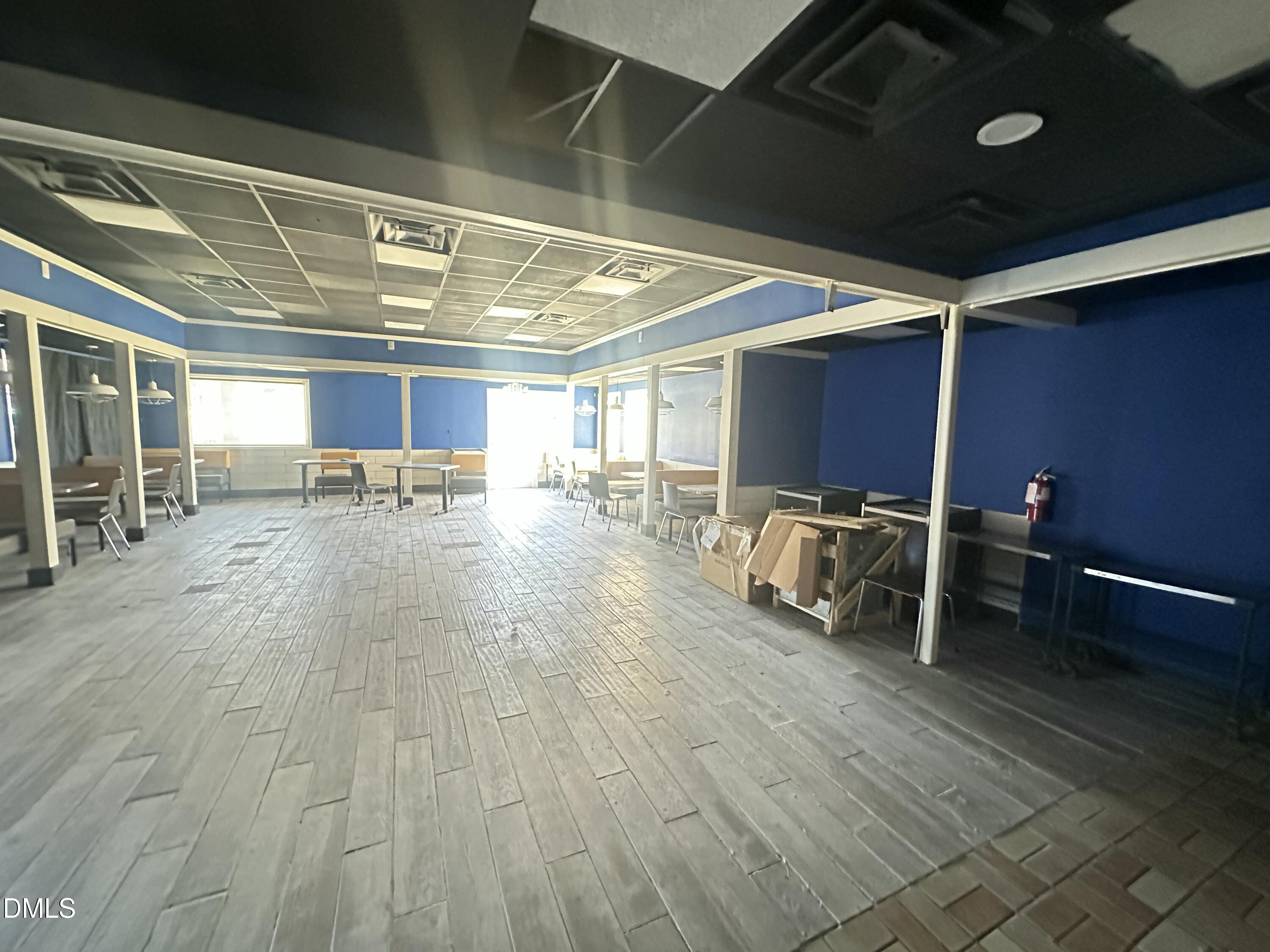 3203 North Roxboro Street Durham, NC 27704 - Photo 9 of 14 a view of a room with gym equipment