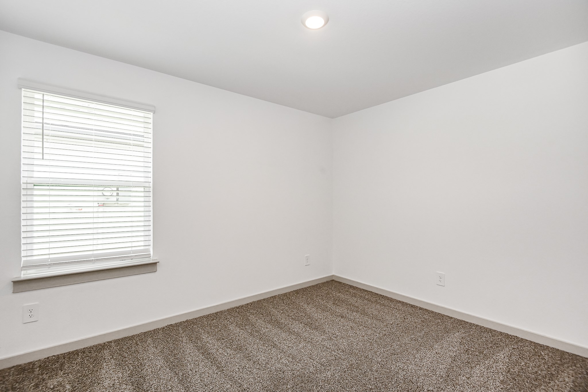 525 Hunter Grove Lane China, TX 77613 - Photo 18 of 27 an empty room with a window