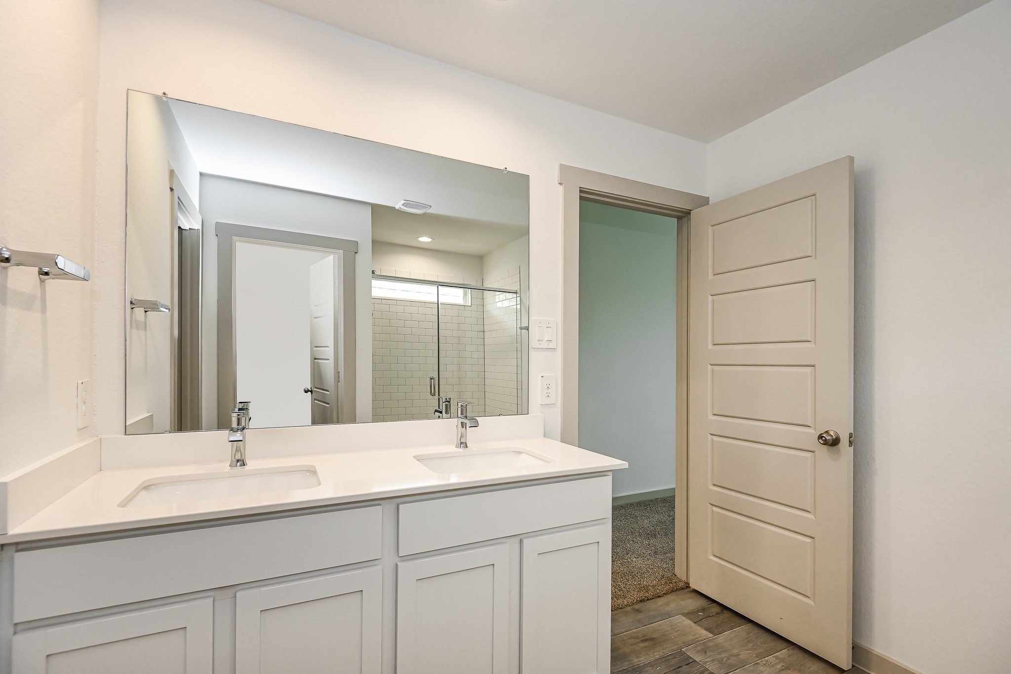 525 Hunter Grove Lane China, TX 77613 - Photo 23 of 27 a bathroom with a double vanity sink and a mirror