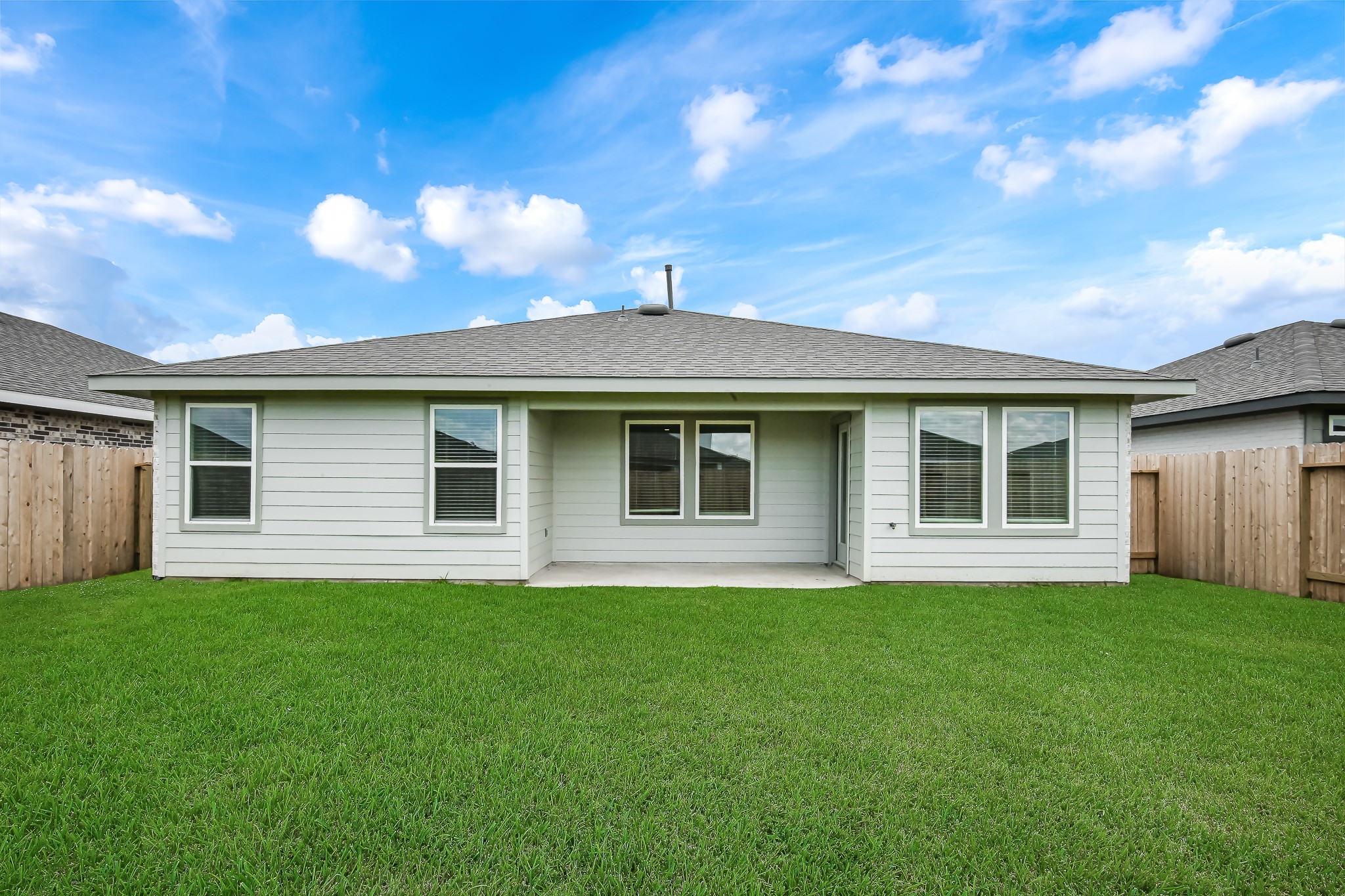 525 Hunter Grove Lane China, TX 77613 - Photo 26 of 27 a front view of house with yard and trees in the background