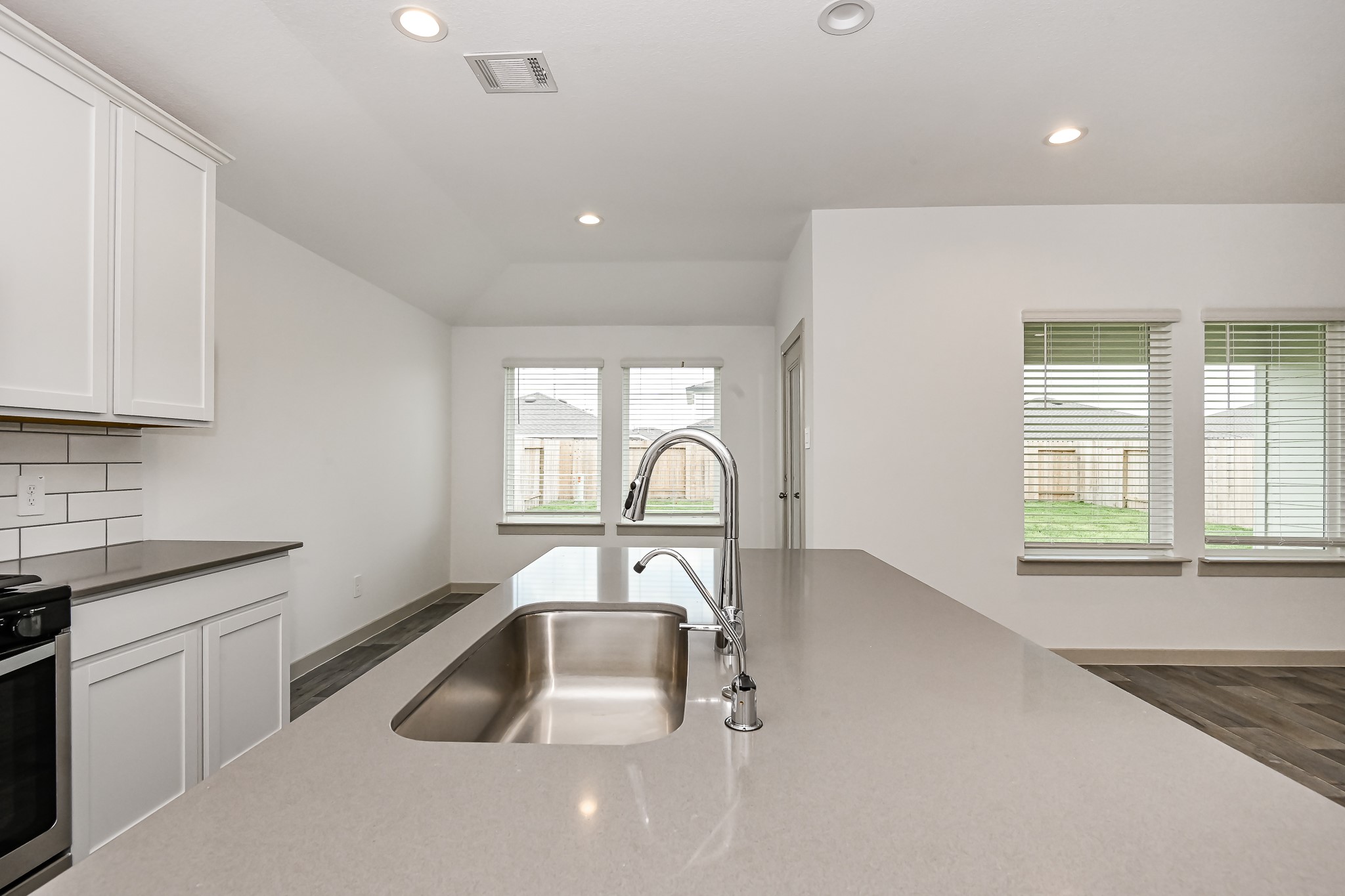 525 Hunter Grove Lane China, TX 77613 - Photo 6 of 27 a kitchen with a sink and a stove top oven