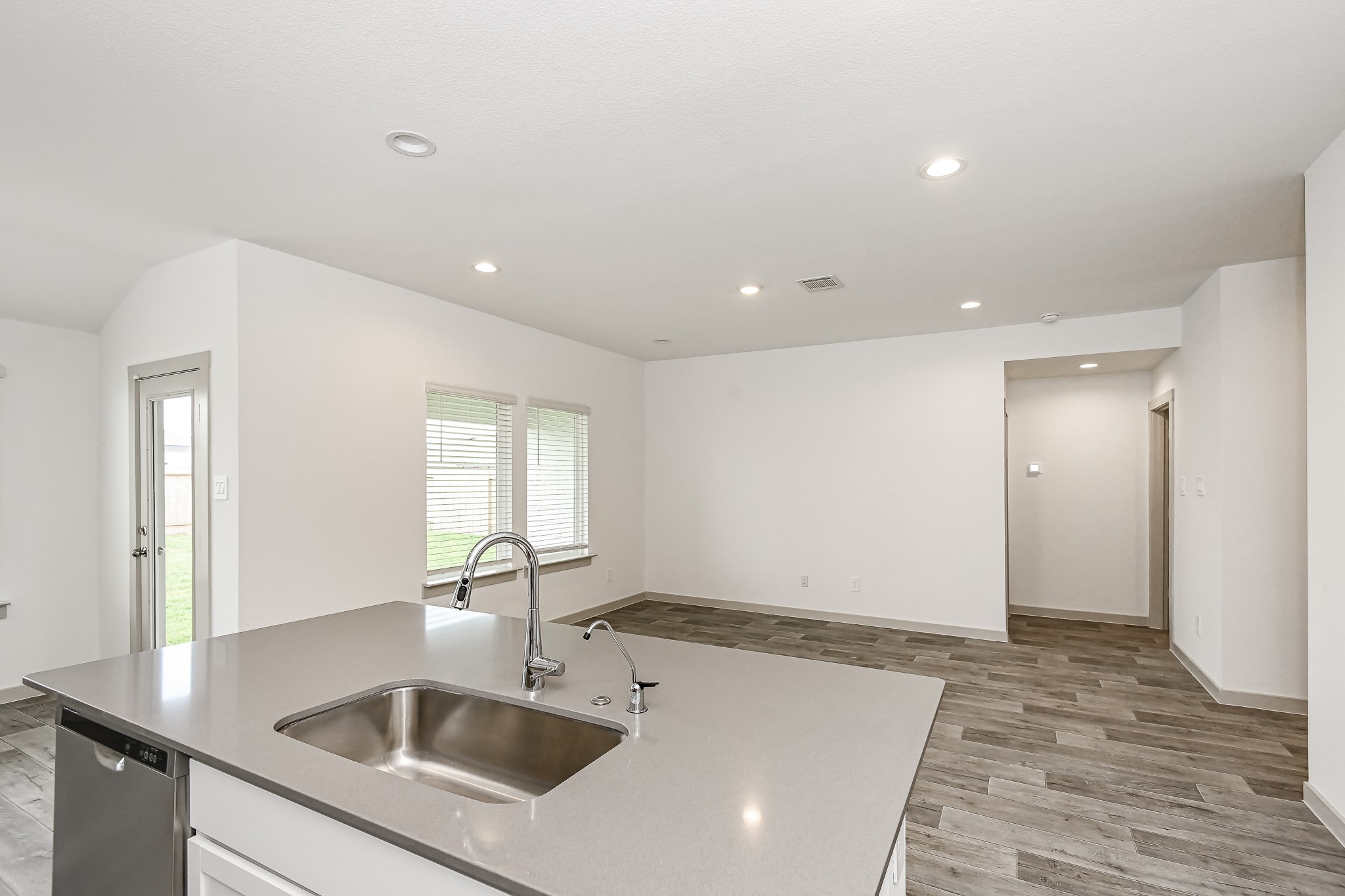 525 Hunter Grove Lane China, TX 77613 - Photo 7 of 27 a kitchen with a sink and cabinets