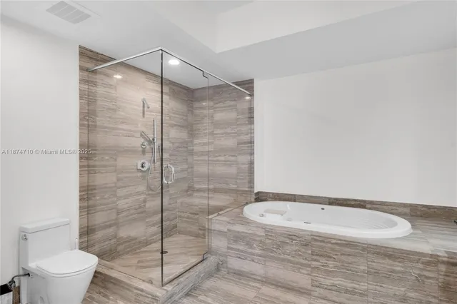 a view of swimming pool with seating space