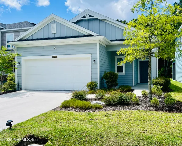 a bathroom with a sink toilet and a mirror