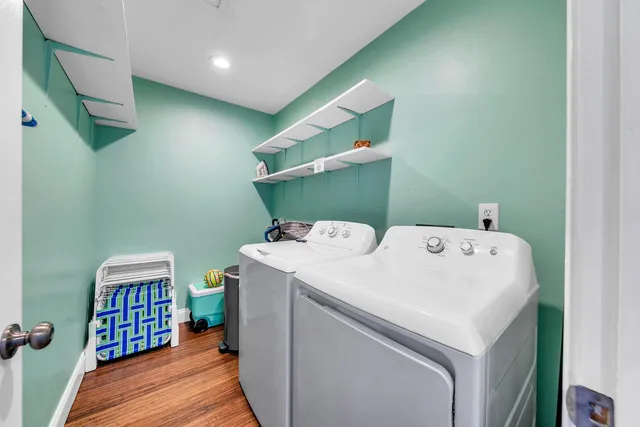 a view of a swimming pool with a lounge chair