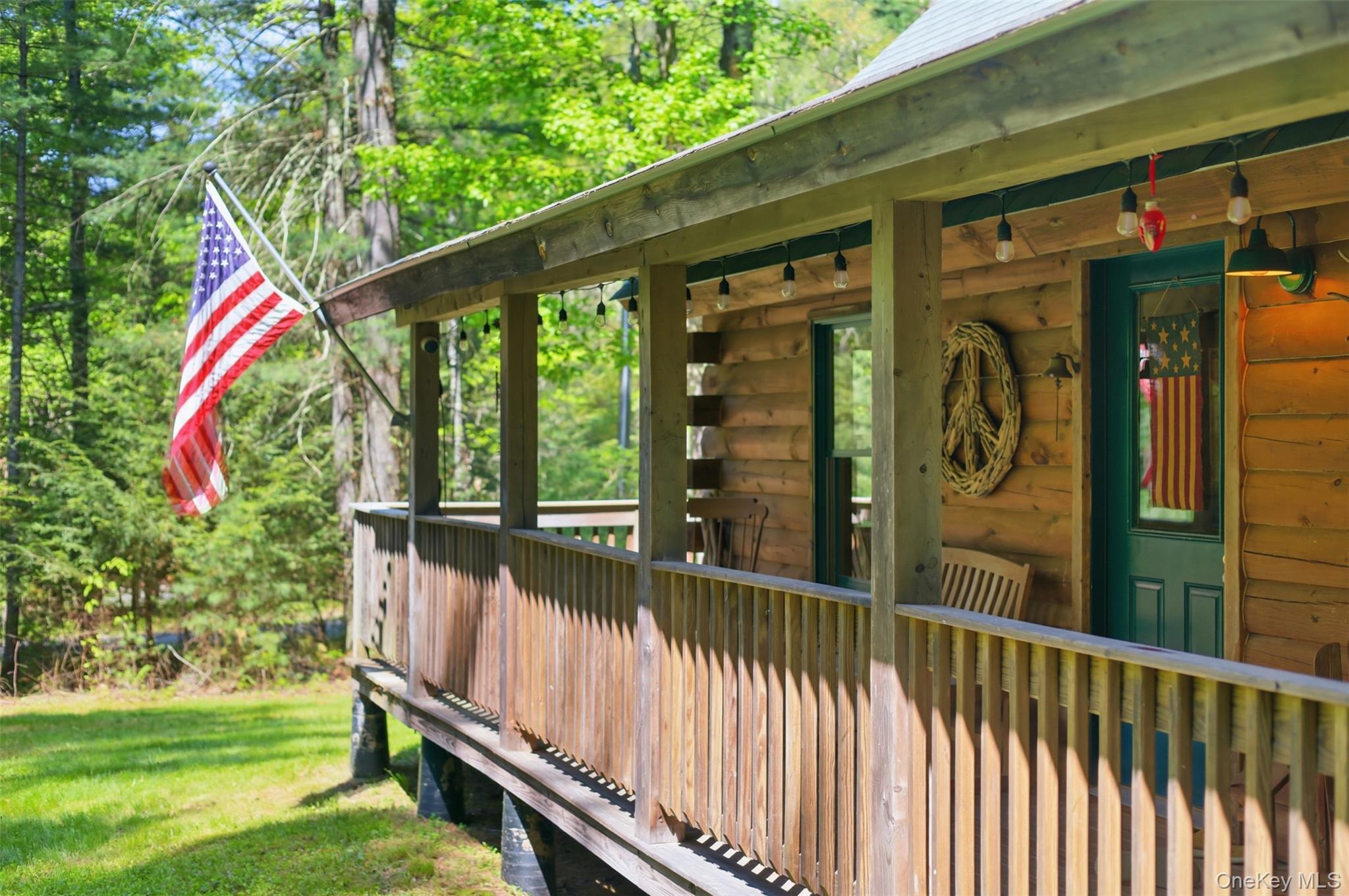 301 Pucky Huddle Road Bethel, NY 12720 - Photo 1 of 39 Wrap around, covered porch perfect for rocking chairs and morning coffee.