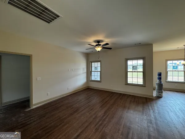 an empty room with windows