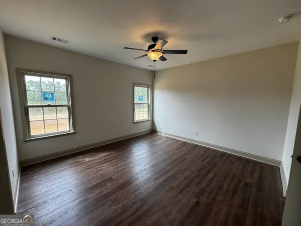 an empty room with windows
