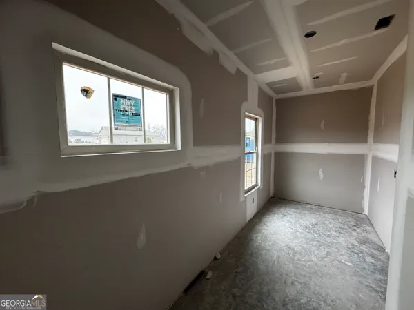 a bathroom with a bathtub and a sink