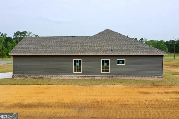 front view of a house with yard