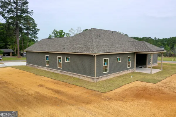a view of backyard of house