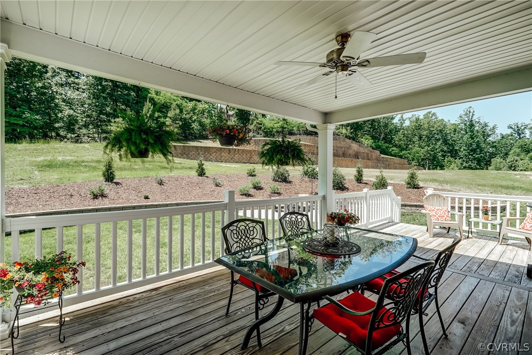 3119 Handley Road Midlothian, VA 23113 - Photo 36 of 41 a view of a chairs and table in patio with wooden floor