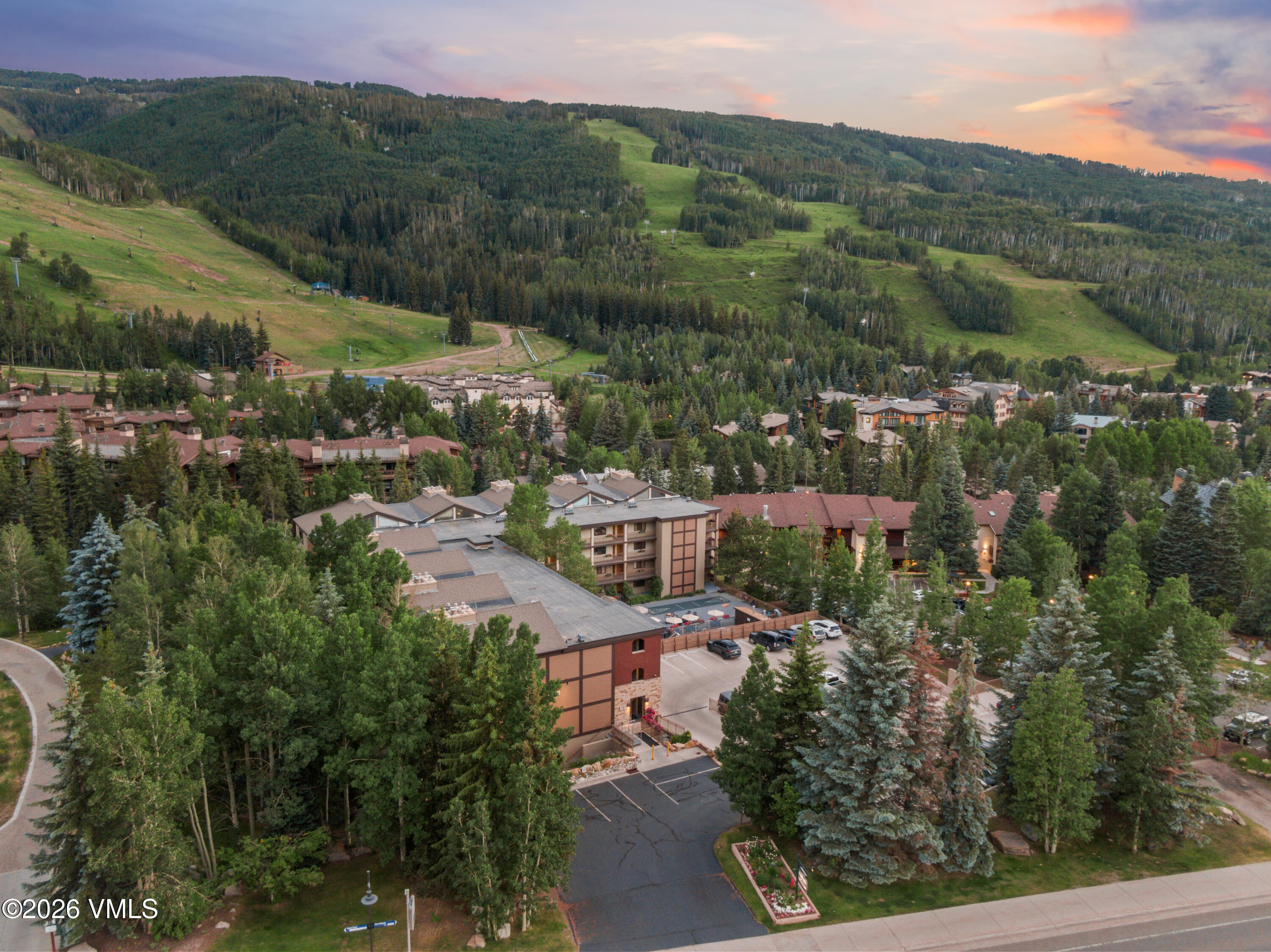 500 South Frontage Road East, Unit 308 Vail, CO 81657 - Photo 21 of 25 an aerial view of residential houses with outdoor space and trees