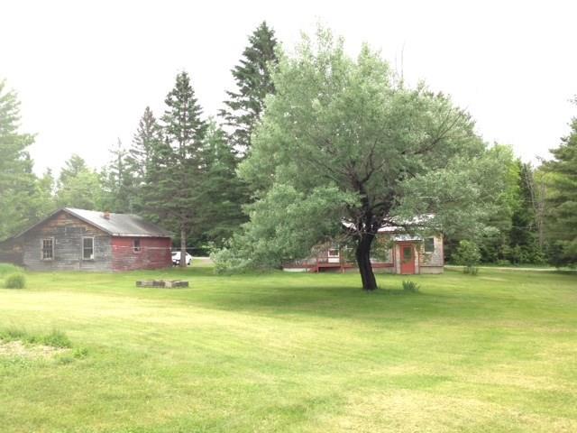 170 Sebec Lake Road Willimantic, ME 04443 - Photo 4 of 15 The garage is not in good repair. ...