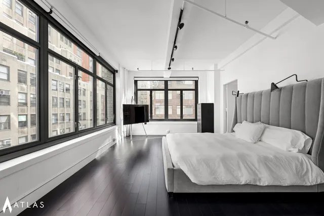 a bathroom with a bathtub and sink