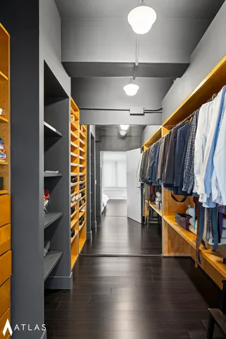 a bathroom with a sink a mirror and a bathtub
