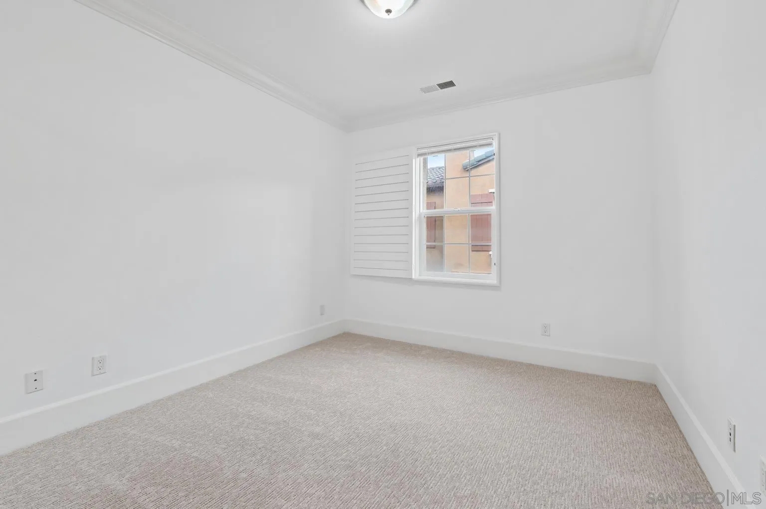 13002 Requlo Place San Diego, CA 92130 - Photo 13 of 17 an empty room with a window