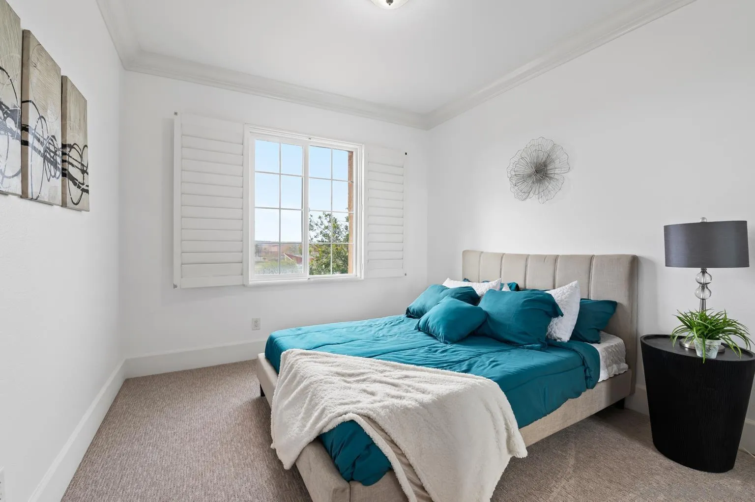 13002 Requlo Place San Diego, CA 92130 - Photo 7 of 17 a bedroom with a bed and a potted plant