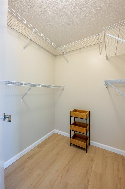 128 Crooked Pine Road Port Orange, FL 32128 - Photo 21 of 46 a room with a walk in closet