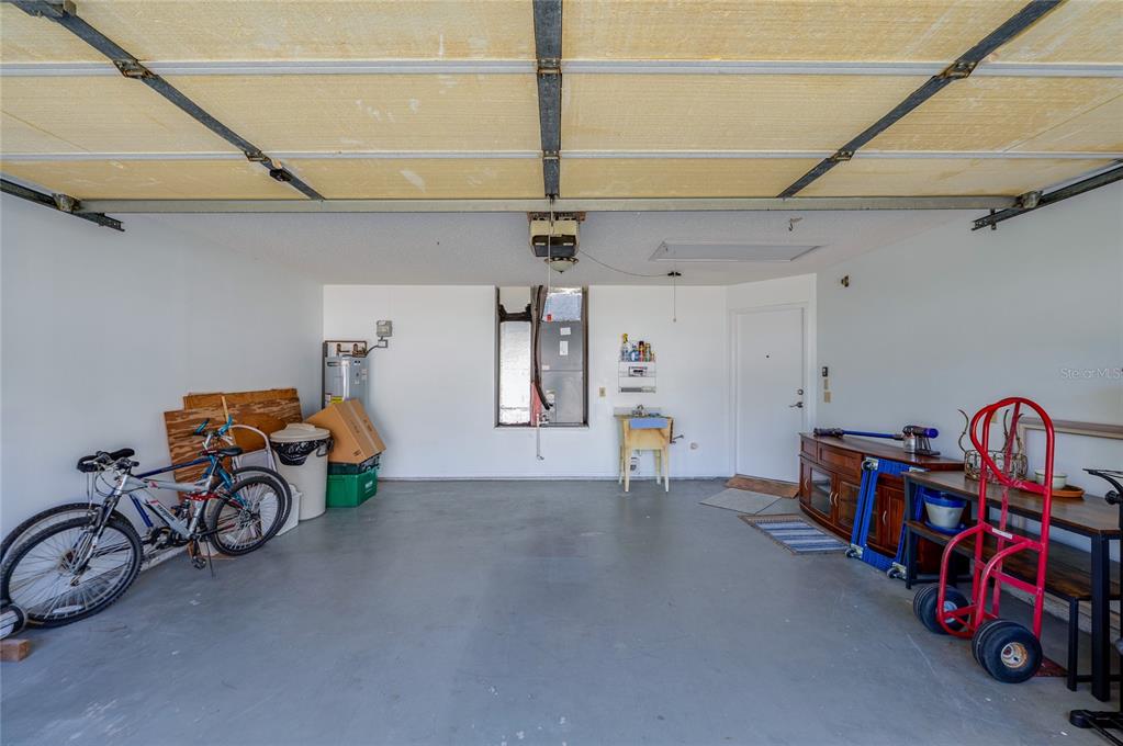 128 Crooked Pine Road Port Orange, FL 32128 - Photo 33 of 46 a view of car garage