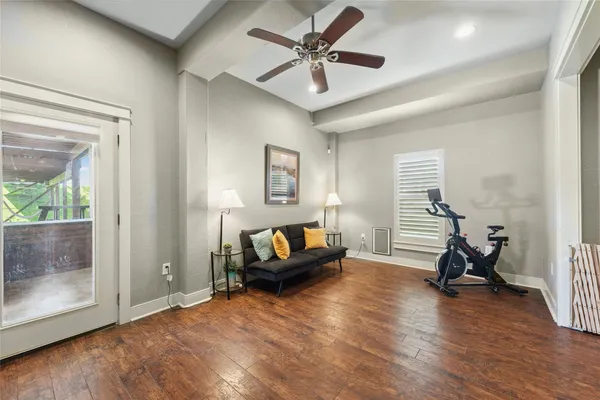 a view of an empty room with a fireplace