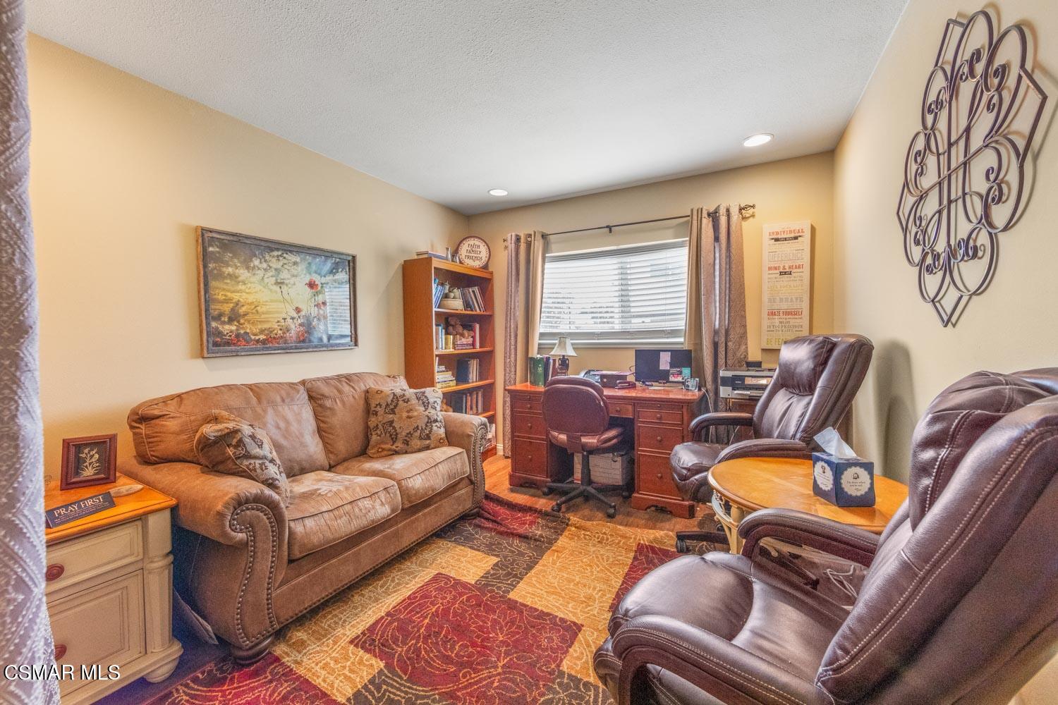 2413 Lita Place Simi Valley, CA 93063 - Photo 11 of 17 a living room with furniture or couch and a window