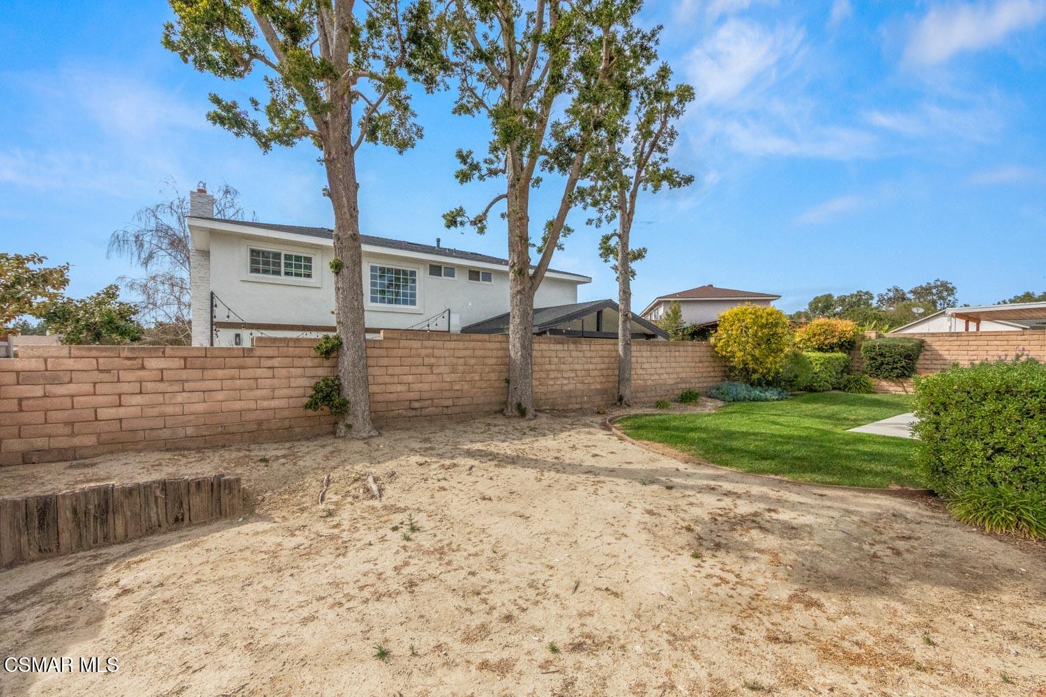 2413 Lita Place Simi Valley, CA 93063 - Photo 17 of 17 a view of a house with a tree