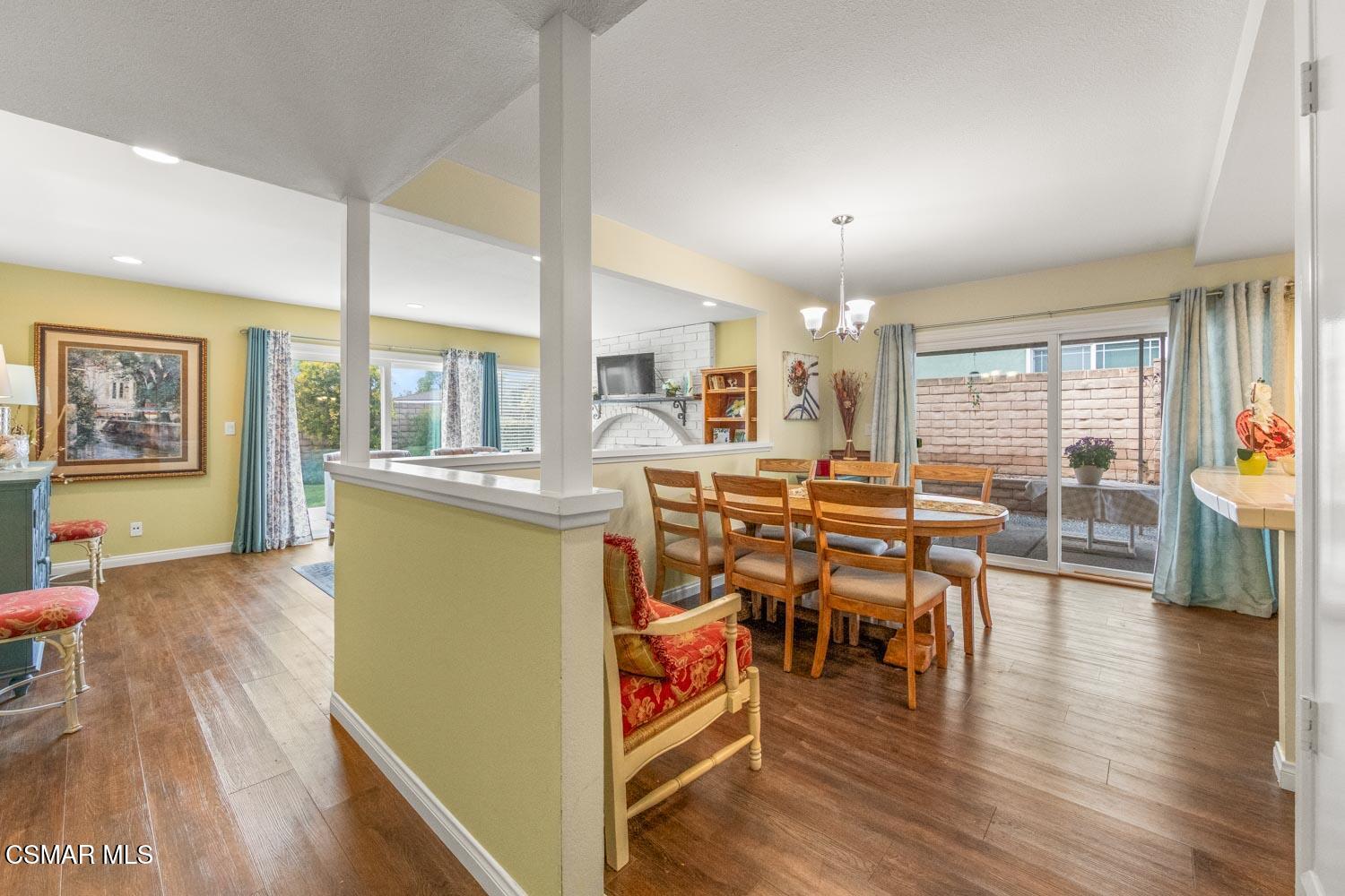 2413 Lita Place Simi Valley, CA 93063 - Photo 3 of 17 a view of a dining room with furniture and wooden floor