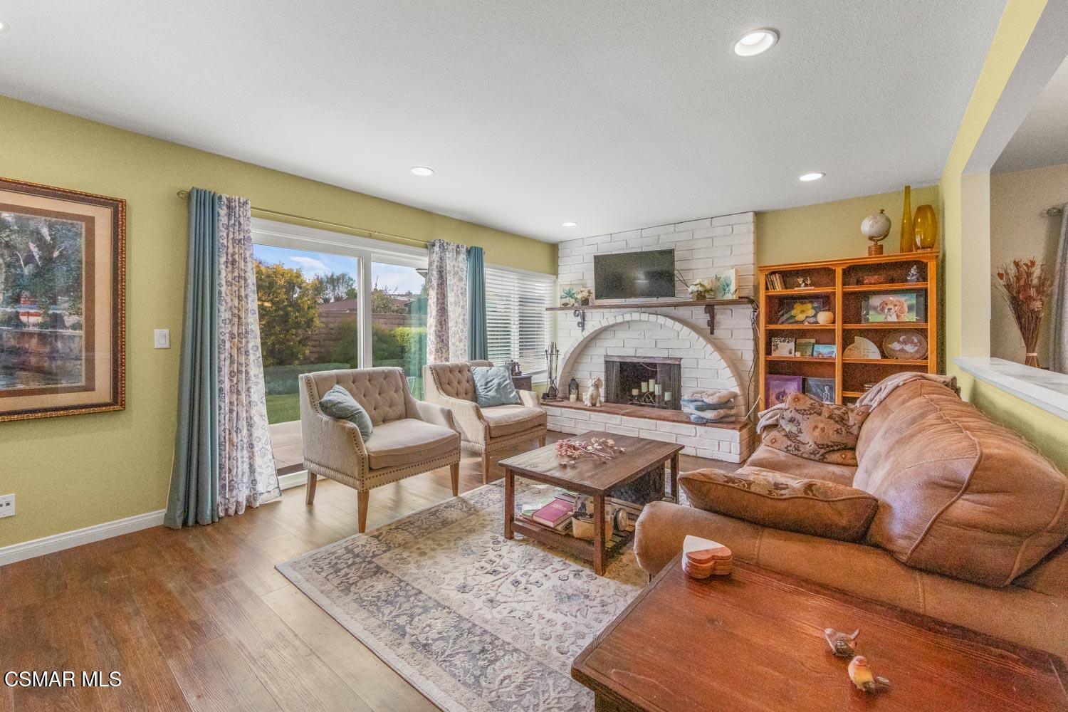 2413 Lita Place Simi Valley, CA 93063 - Photo 7 of 17 a living room with furniture and a wooden floor