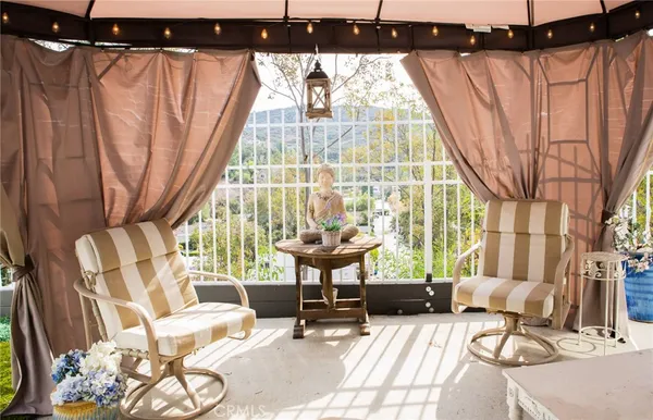 a view of a living room and a window