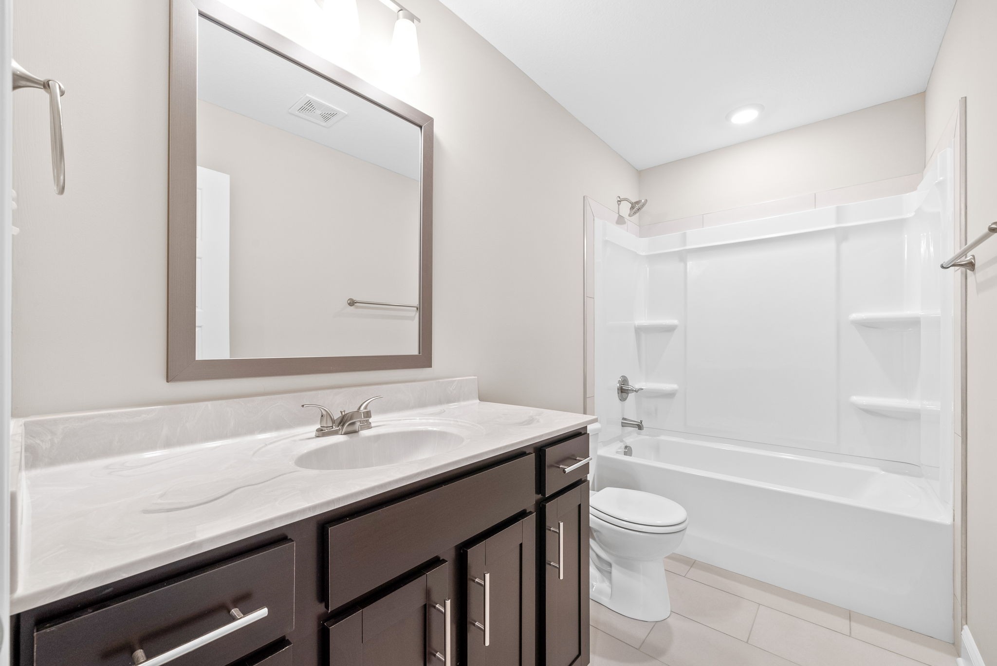 30 Echo Ridge Oak Grove, KY 42262 - Photo 17 of 43 a bathroom with a granite countertop sink a toilet and shower