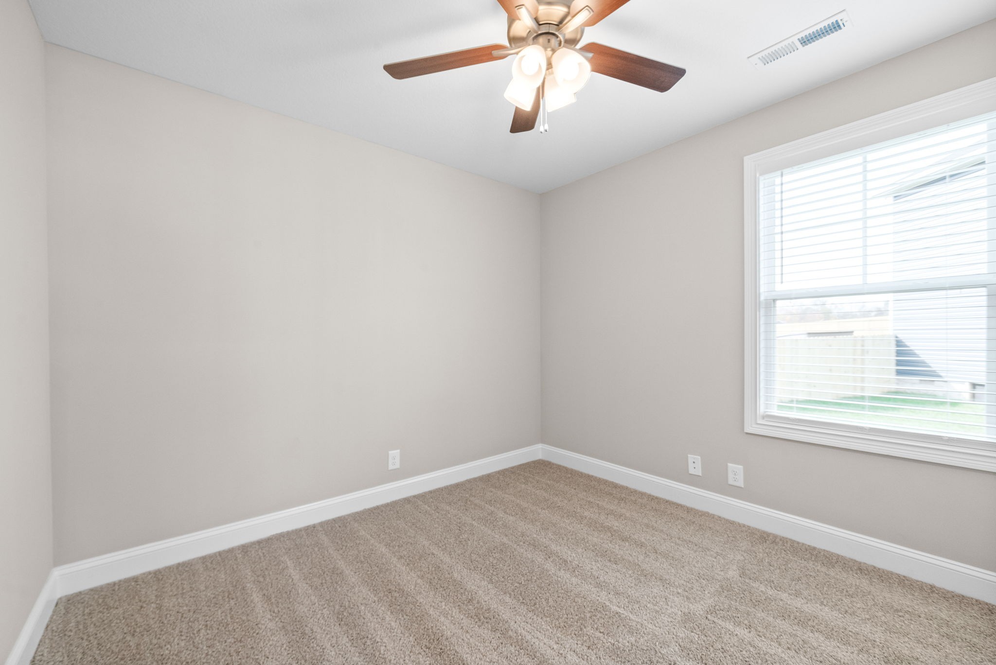 30 Echo Ridge Oak Grove, KY 42262 - Photo 18 of 43 an empty room with a window and a fan