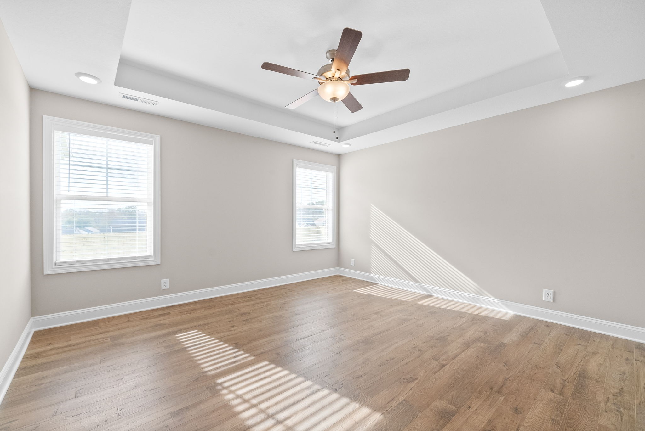 30 Echo Ridge Oak Grove, KY 42262 - Photo 20 of 43 a view of an empty room with wooden floor and a window