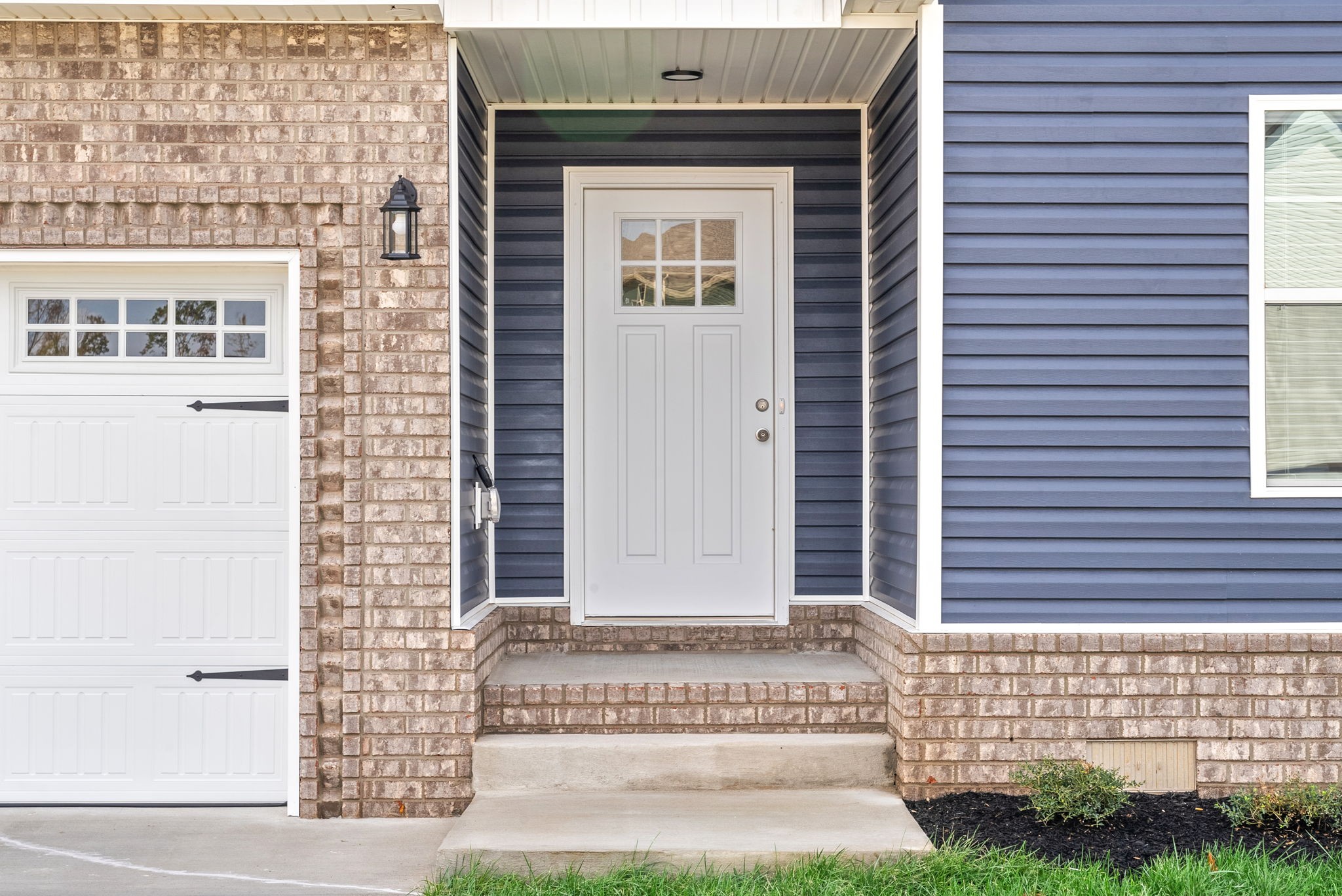 30 Echo Ridge Oak Grove, KY 42262 - Photo 3 of 43 a front view of a house with a garden
